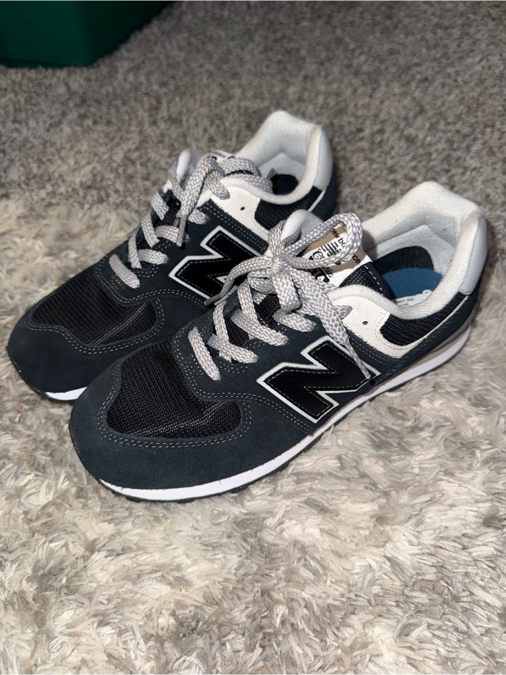 New Balance Kids Black and White Low-Top Sneakers